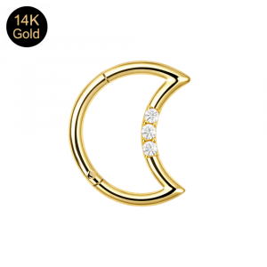 Detailed close-up macro view of the 14K gold crescent moon showing the secure prong-set CZ stones