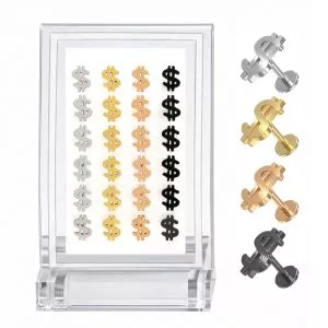 Professional wholesale display of a 24-piece G23 titanium dollar sign labret kit arranged in assorted silver, gold, rose gold, and black finishes.