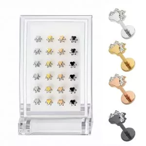 Wholesale G23 titanium jeweled animal paw labret studs assorted color variation image with clear acrylic display stand and individual silver, gold, rose gold, and black paw jewelry pieces.
