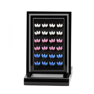 Assorted color variations of G23 titanium triple opal labrets featuring white, pink, and blue opal options in a 24-piece display kit.