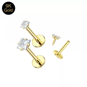 9K solid yellow gold threadless labret featuring 2.0mm and 3.0mm square prong-set cubic zirconia tops with an exclusive brand-fit push-pin system for professional piercers.